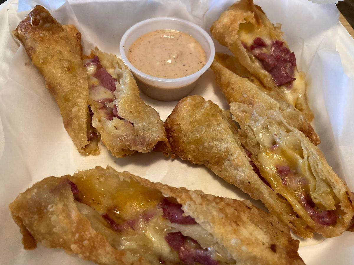 Ruben eggrolls with shredded corned beef, Swiss and cheddar cheese with pub sauce from downtown Macon’s Bearfoot Tavern food truck.