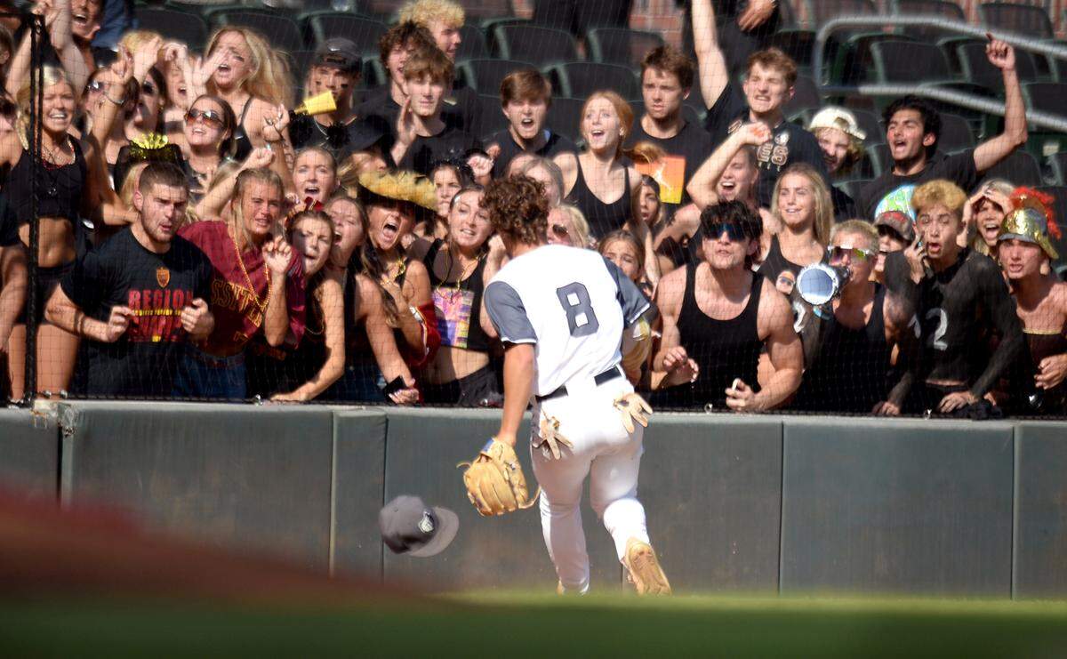 Houston County third baseman Drew Burress (8) chases down a ball during game one of the BearsÕ GHSA 6A Championship series against Lassiter Wednesday in Atlanta. Lassiter took a 1-0 lead on the error from pitcher Brodie Chestnutt.