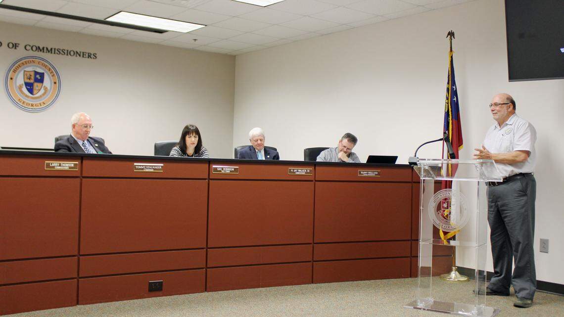 Houston County Utilities Superintendent Dan Walker speaks to the County Commission on Tuesday about new water meters that can be read just by driving by.