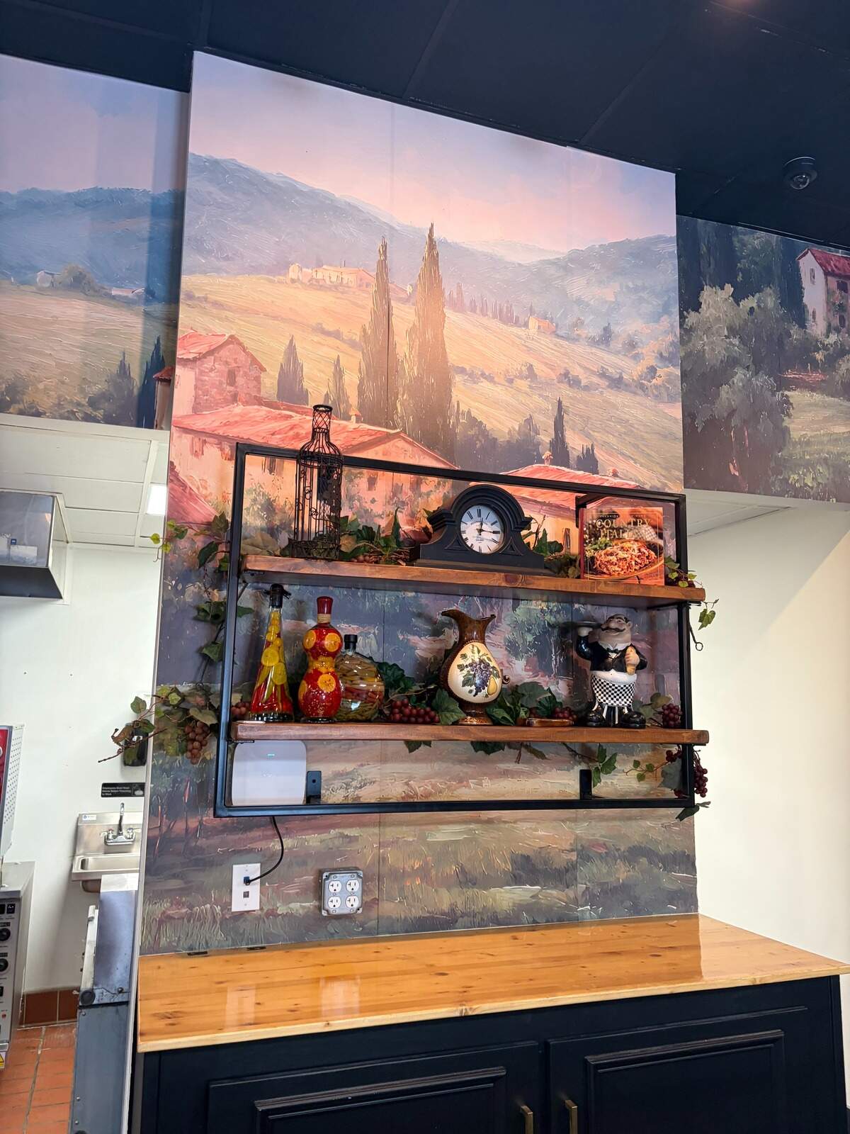 An Italian scene at the new Good ‘n Plenty Steak House and International Buffet in Warner Robins pays homage to Italy, one of the countries from which food will be featured on the buffet.