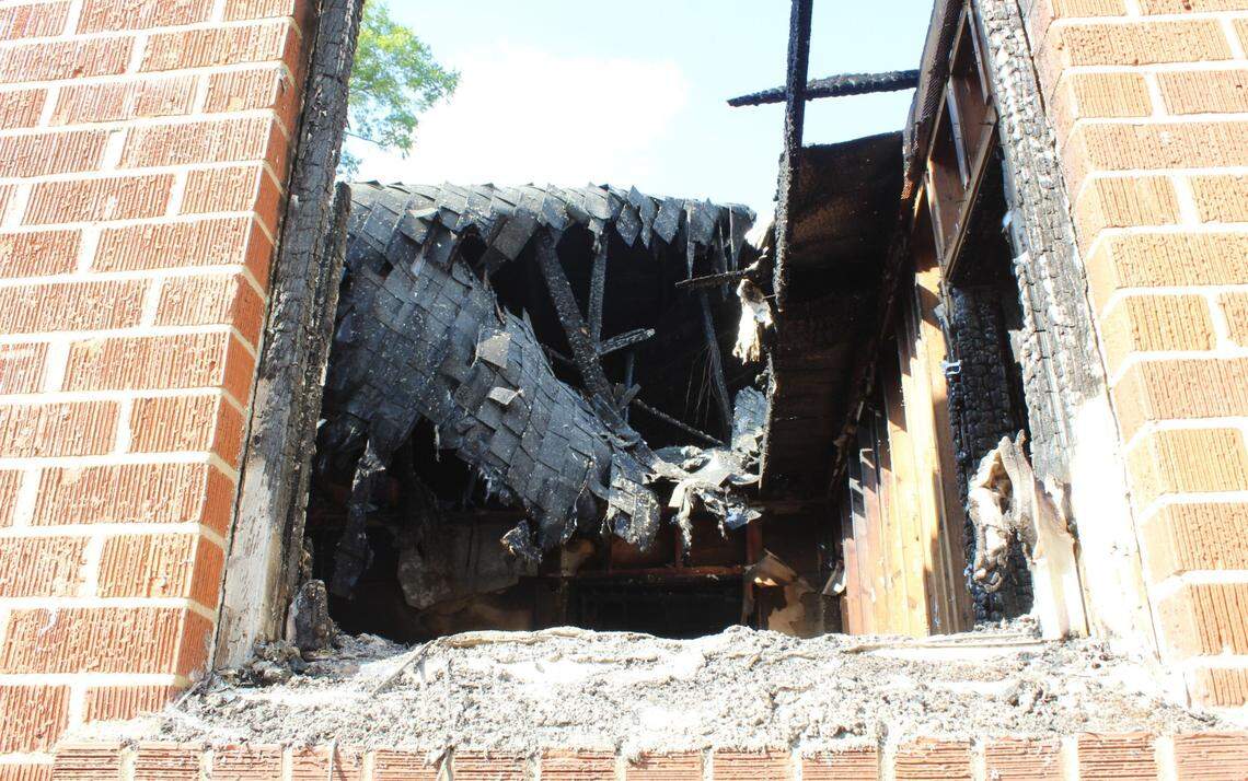The roof caved into the brick building of Byron United Methodist Church after a man allegedly lit it ablaze on August 20, 2024.