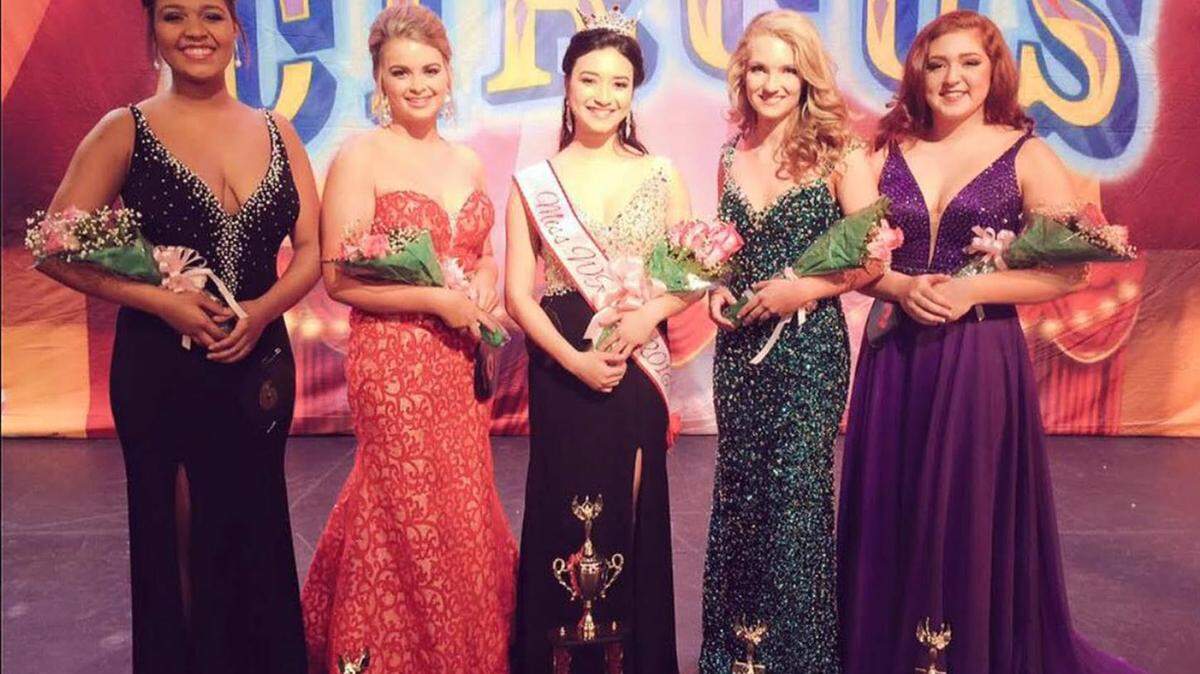 Tarah-Anne Abrigo, Miss Warner Robins High School, center, poses for a photo with Allianna Malloy, fourth runner-up; Annabelle Smith, second runner-up; Gillian Pritchett, first runner-up; and Juliette Mossman, third runner-up.