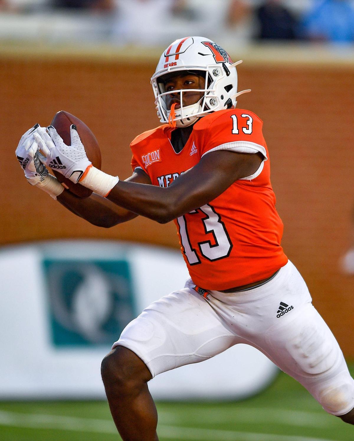 DONN RODENROTH,Macon, Georgia, 02/27/2021: Mercer wide receiver Ty James hauls in a pass from Carter Peevey for a touchdown against the Citadel.