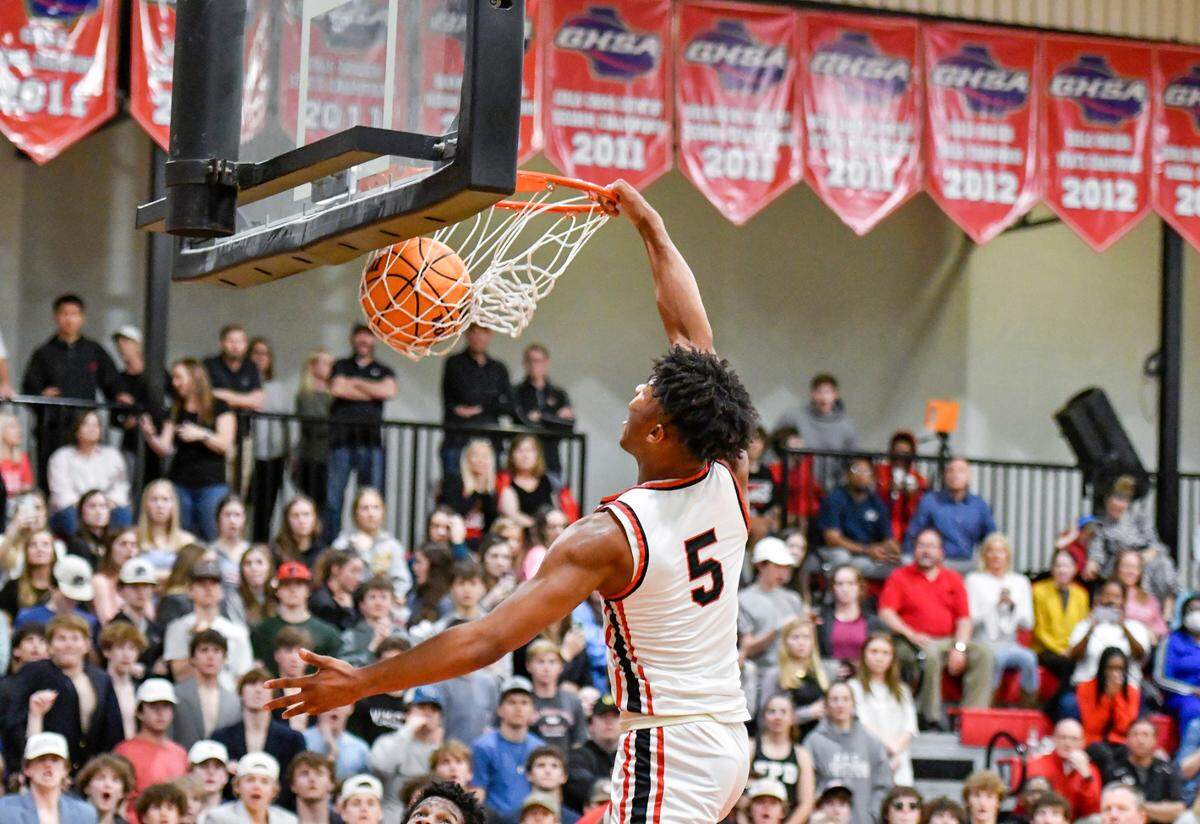 FPD’s Jakhari Williams (5) throws down a dunk during the Vikings’ 64-53 win over St. Francis to advance to the GHSA 1A (Private) Final Four.