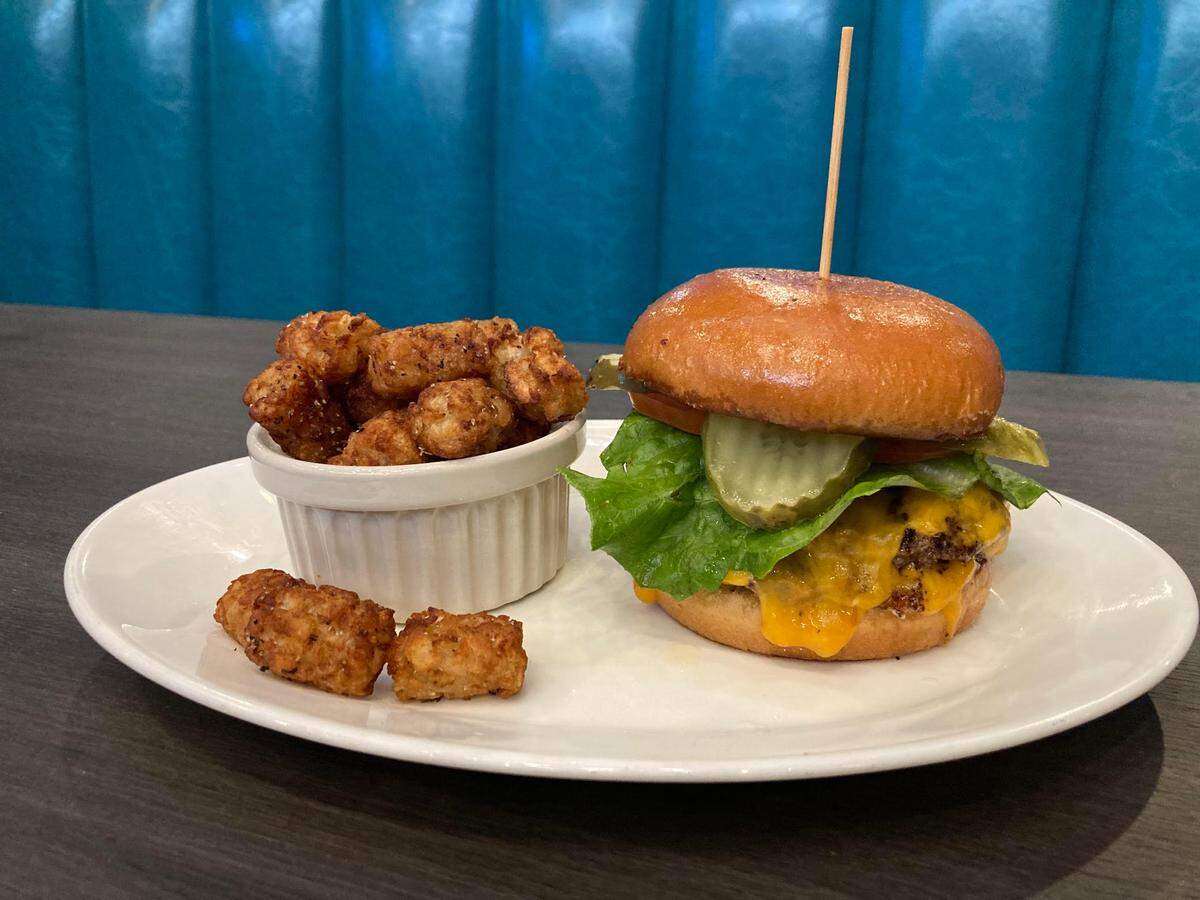 Mel’s classic burger with spud puppies (baked tater tots) at Mellow Mushroom in Warner Robins.