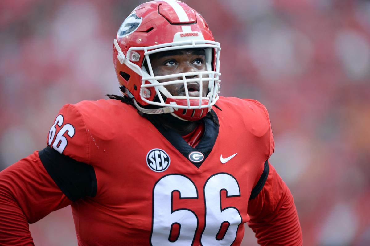 Georgia linebacker Solomon Kindley (66) checks the action on the jumbotron between plays warming up for Tennessee on Sept. 29. Georgia beat Tennessee, 38-12.