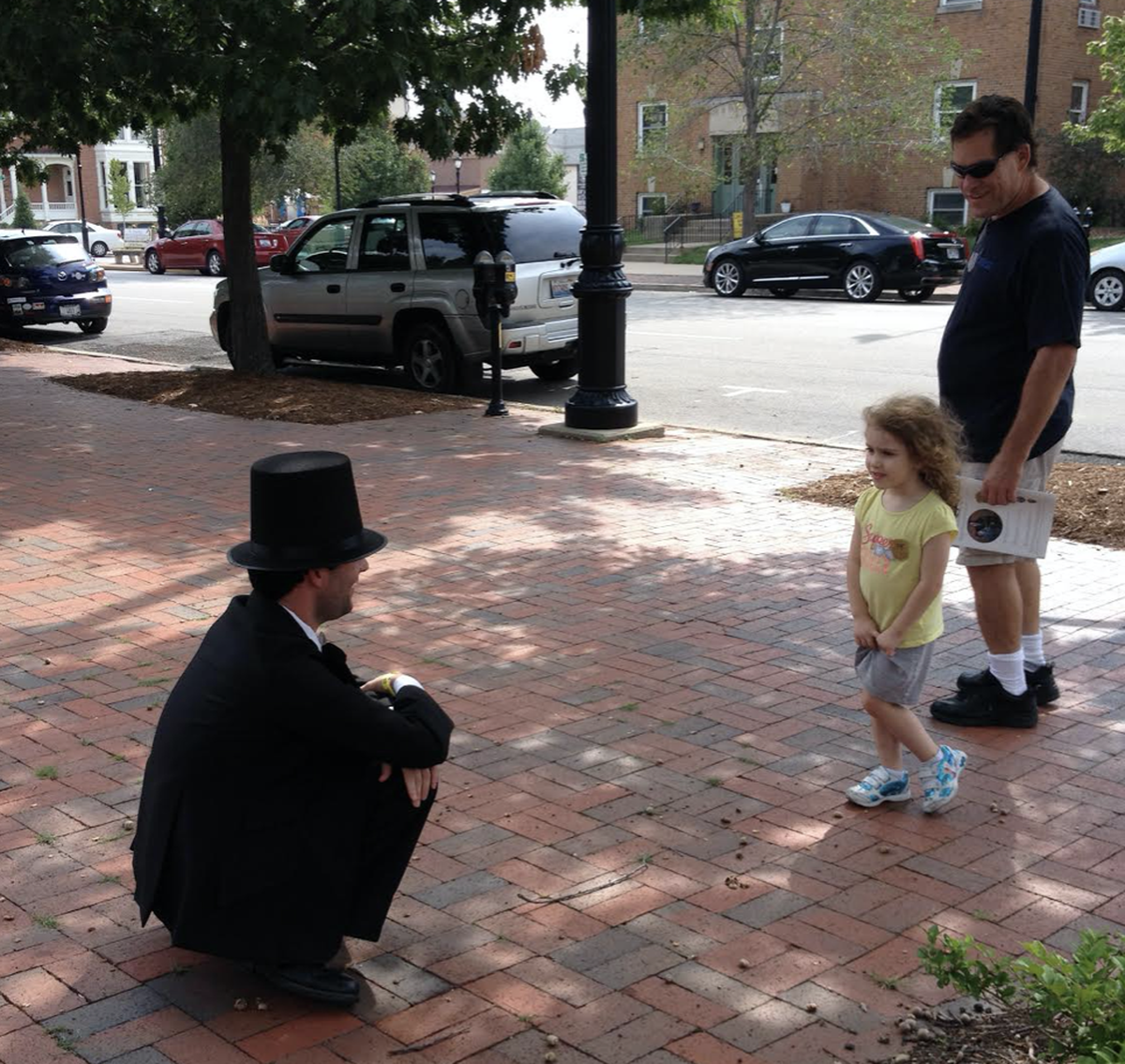 Ben Marsh dressed as Abe in 2014 on the sidewalks of Springfield, Illinois.