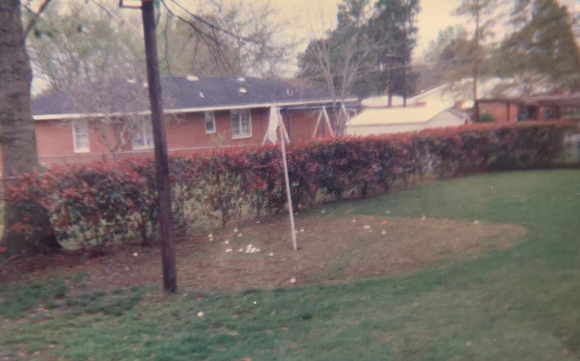 Buddy Dean built a makeshift hole in his backyard for chipping practice.