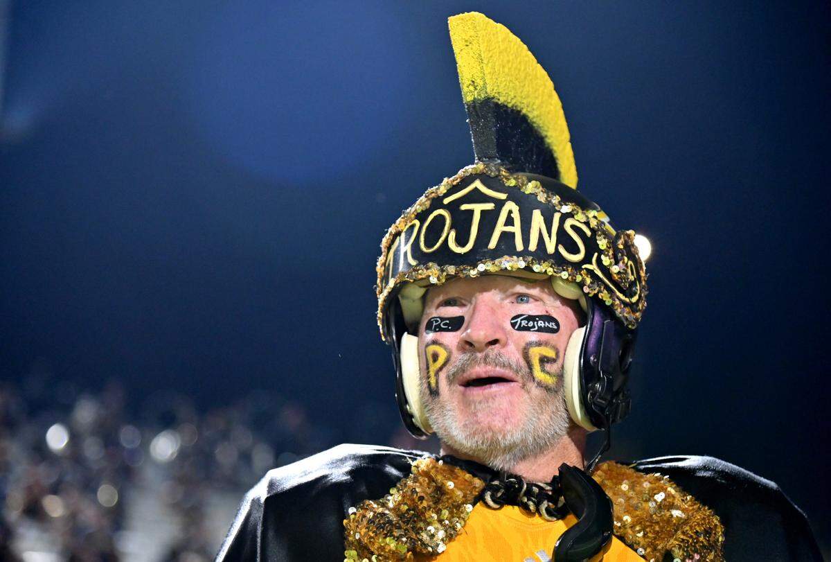 Daryl Hawkins, 67, is in his 31st full season as his alma mater Peach County’s mascot. Hawkins has been roaming the Trojans’ sidelines since the 1992 state championship game.