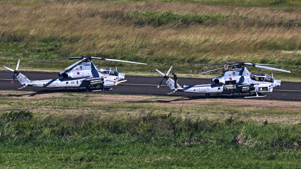 A US Marine Corps AH-1Z Viper attack helicopters sits on the tarmac at JosÃ© Aponte de la Torre Airport, formerly Roosevelt Roads Naval Station, on December 26, 2025 in Ceiba, Puerto Rico. The United States has deployed a major military force in the Caribbean and has recently intercepted oil tankers as part of a naval blockade against Venezuelan vessels it considers to be under sanctions. Since September, US forces have launched dozens of air strikes on boats that Washington alleges, without showing evidence, were transporting drugs. More than 100 people have been killed. (Photo by Miguel J. Rodriguez Carrillo / AFP via Getty Images)