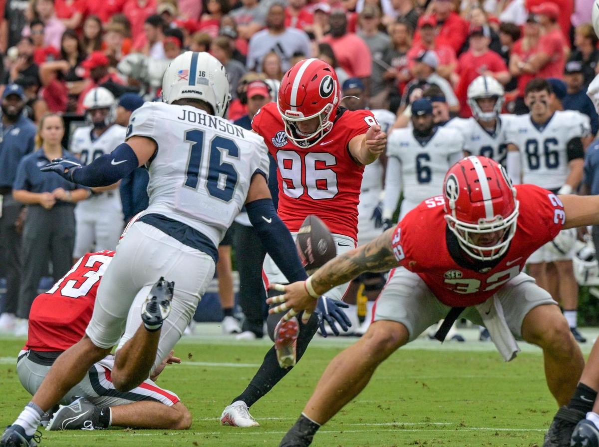Podlesny kicking PAT in first half