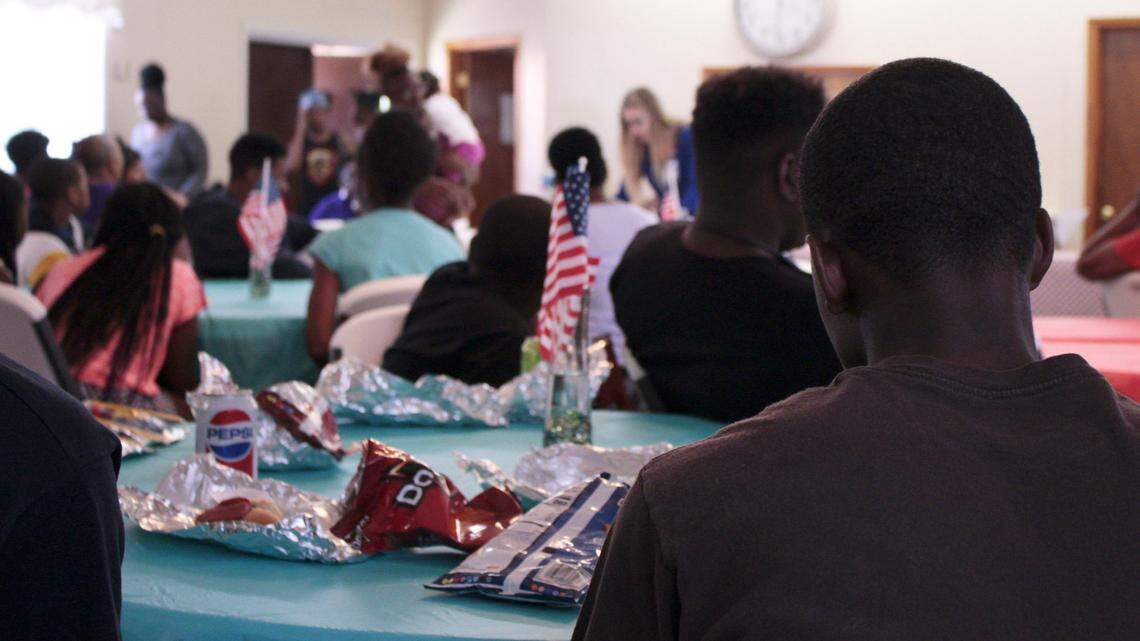 Dozens of kids and a handful of parents crowded into a small Methodist church in Fort Valley in June to participate in what the organizers called a community youth summit.