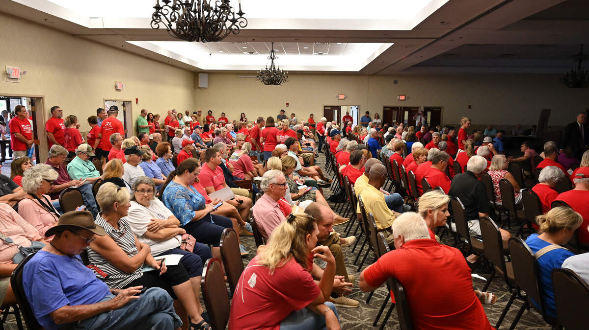 Hundreds of concerned residents fill a ballroom for a Monroe County Planning and Zoning Board meeting in opposition of a proposed rezoning for a new data center in Bolingbroke at the Monroe County Conference Center on Monday, July 28, 2025, in Forsyth, Georgia. The Monroe County Planning & Zoning Board voted unanimously Monday evening against rezoning about 90 acres of land for the project. 