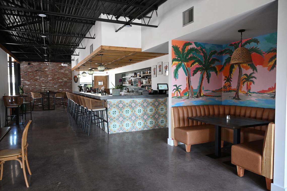 Vida Latin Kitchen owners Paula and Ernesto Aguirre took inspiration from Cuban culture in the decor of their new Macon restaurant with elements such as the vibrant tile used in the bar and the tropical mural. 