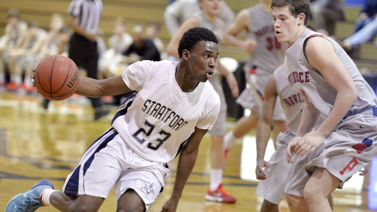 Stratford’s Quintez Cephus (23) drives to the basket during their first round GHSA Class A private school playoff game against Providence Christian last season.