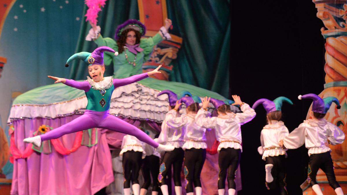 Jesters perform for a packed Grand Opera House audience during a performance of “The Nutcracker.”