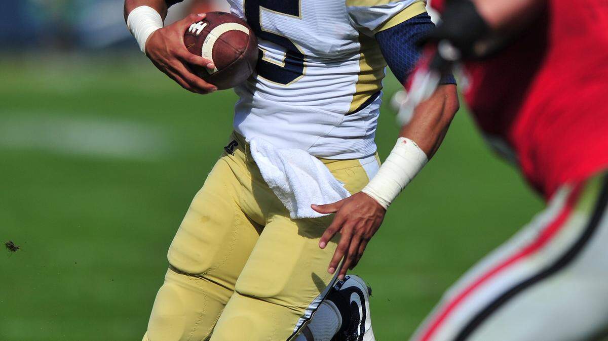 EVAN RODENROTH/FOR THE TELEGRAPHGeorgia Tech quarterback Justin Thomas (5) and the Yellow Jackets lost nine of their final 10 games.