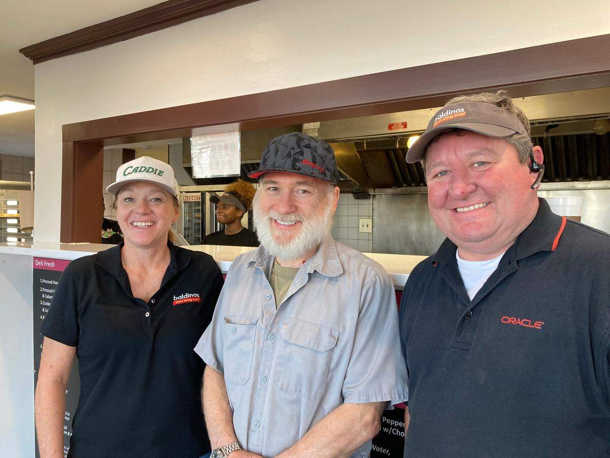 Jan and Andy Clark, co-owners of the new Baldinos Giant Jersey Subs in Warner Robins, with Mike Mellons, center, who owned and operated Mike’s Hot Dogs & Hamburgers with his wife, Rita, for more than 35 years. The new Baldinos is in the building that once housed Mike’s Hot Dogs & Hamburgers.