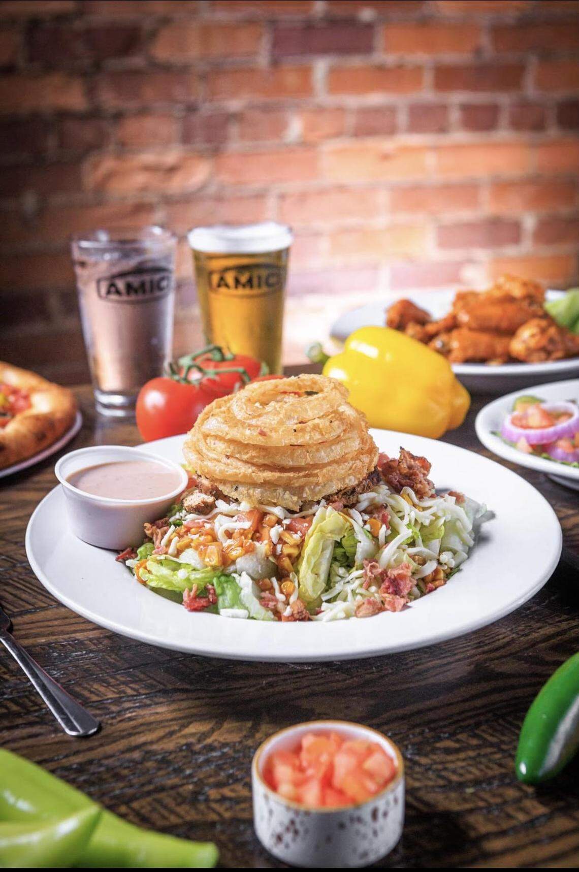 Amici Italian Cafe & Brewery opening soon in Perry will offer variety of salads in addition to pizza, calzones, wings, sandwiches, appetizers and pasta dishes.