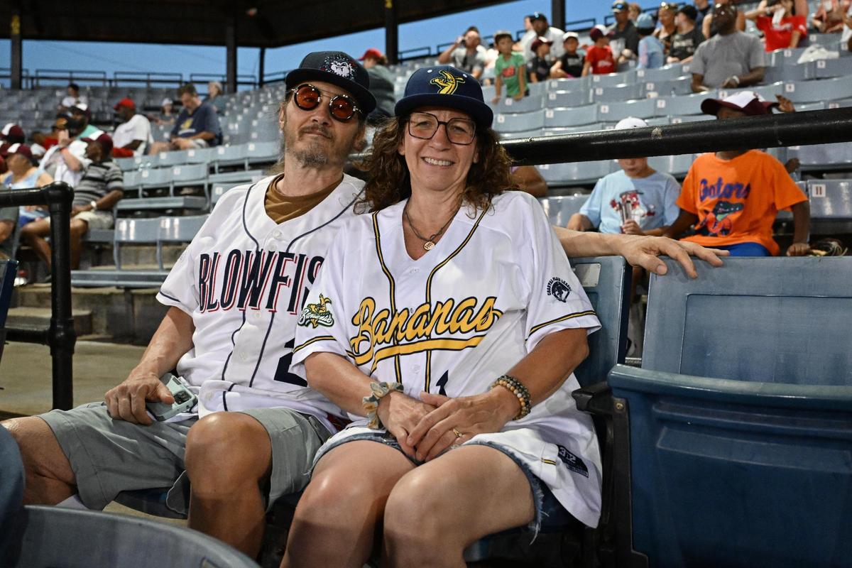Jeffrey (left) and Ronda Swartzmiller, from Weirton, West Virginia, pose for a portrait during the Coastal Plains League All-Star Game on Monday, July 7, 2025, at Luther Williams Field in Macon, Georgia. The husband and wife pair attend baseball games at all levels across the United States