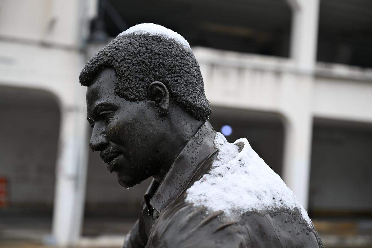 Snow sits on top of the Otis Redding statue on Sunday, Jan. 18, 2026, in downtown Macon, Georgia. The National Weather Service expected Macon to receive 1 to 2 inches of snow on Sunday.