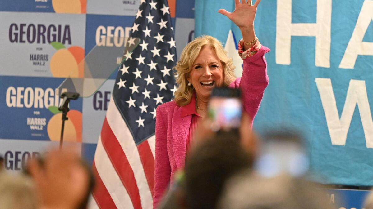 First lady Jill Biden waves to supporters at a canvass launch on Saturday, Nov. 2, 2024, at the Macon Bibb County Democratic Committee office in Macon, Georgia. Biden stopped in three cities in Georgia to campaign for the Harris Walz campaign three days before Election Day.