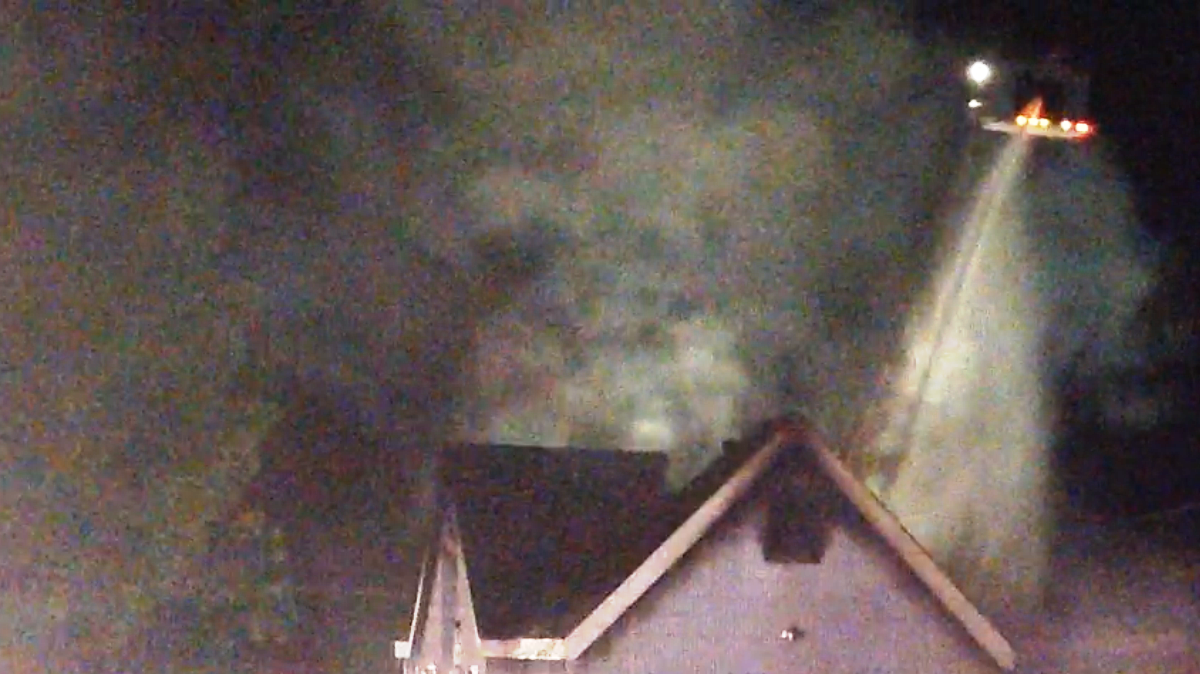 Firefighters douse water on God's Power Church of Church in Macon's Unionville after an early Tuesday fire.
