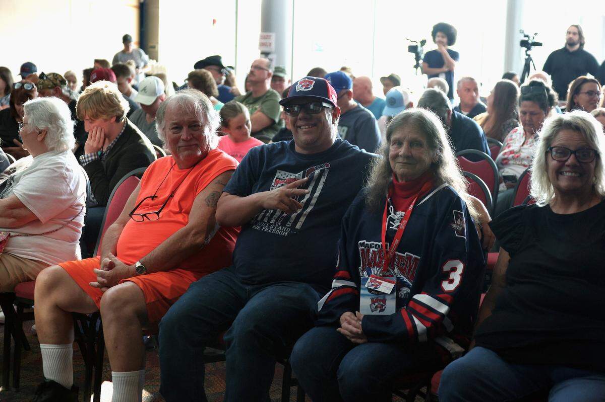 Macon residents attend a press conference for the re-branding of the Macon Mayhem hockey team.