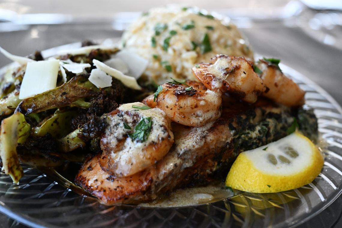Stuffed salmon with sauteed shrimp, risotto rice and sauteed broccoli from ABC Catering, LLC.