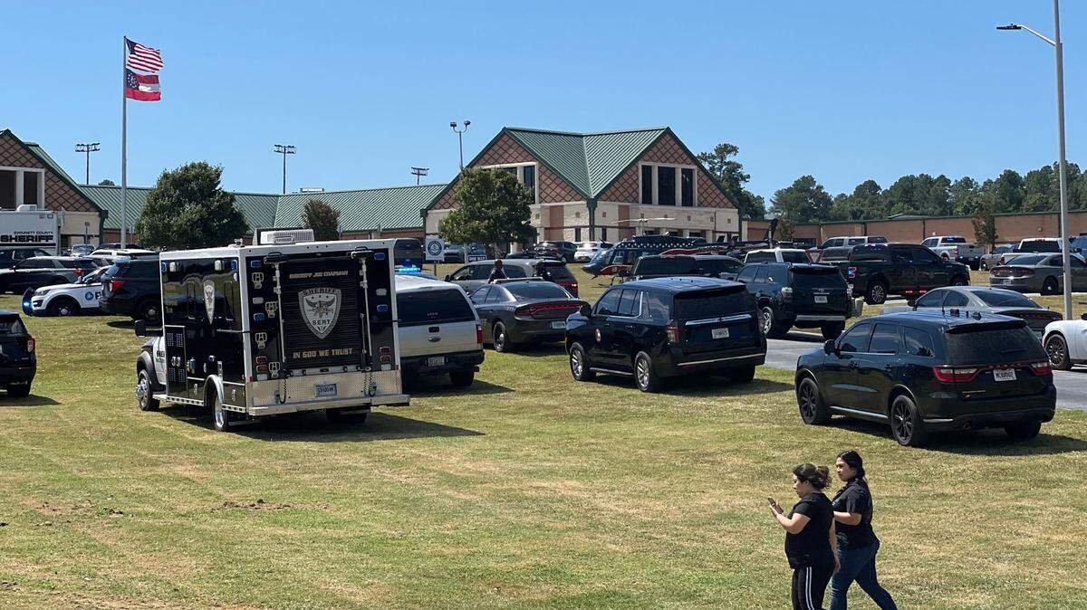 Law enforcement officials at the scene of Apalachee High School, where a shooting left four dead and others injured.
