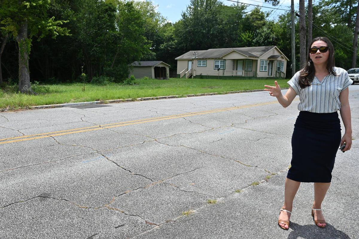 Macon Affordable Housing Fund executive director Natalie Bouyett stands on Villa Esta Avenue and speaks about new potential properties for an affordable housing development off of Houston Avenue on Tuesday, July 22, 2025, in Macon, Georgia. The Macon Affordable Housing Fund and Macon Bibb Urban Development Authority hope that new development will continue to revitalize areas in South Macon.
