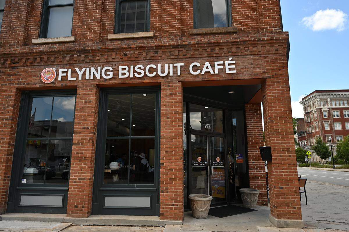 Flying Biscuit Cafe sits on the corner of Mulberry Street and 2nd Street on Saturday, July 26, 2025, in downtown Macon, Georgia. The Atlanta-based breakfast and lunch restaurant opened its 40th location in downtown Macon on Monday. 
