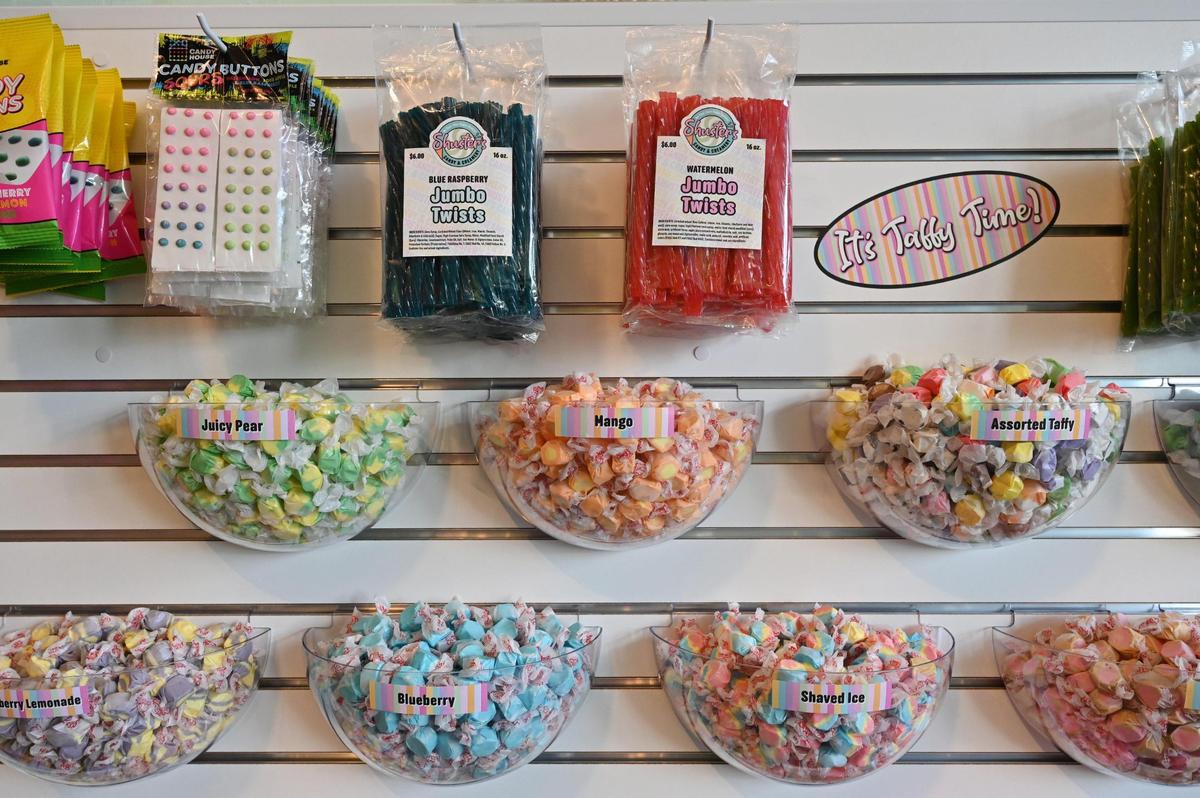 Taffy and licorice hang on the wall inside of Shuster’s Candy and Creamery on Friday, July 18, 2025, in Macon, Georgia. Owners Jonathan and Tennille Shuster wanted to create the atmosphere of an old fashioned candy shop with a contemporary twist.
