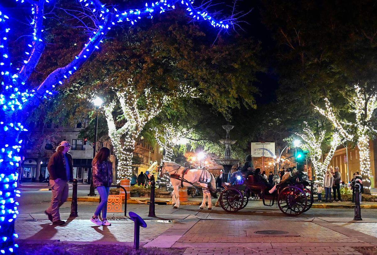 Horse drawn carriage rides were popular on Dec. 19, during the Main Street Christmas Light Extravaganza. The nightly shows feature over 500,000 lights across four streets synchronized with music from the Macon Pops.