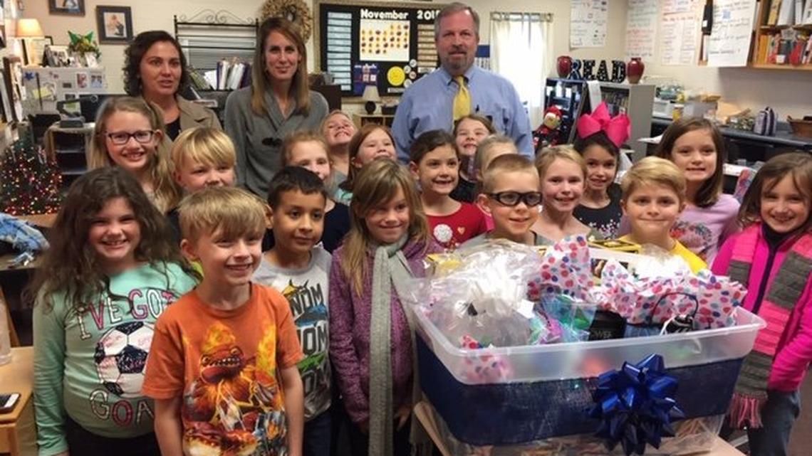 Ashley McConnell, a second grade gifted teacher at Kings Chapel Elementary School, back middle, stands with her students, Principal William Ray and Assistant Principal Shelley Shillcutt after receiving the 2018-2019 Gifted Teacher of the Year award which is presented by the Houston County Association of Gifted Children.