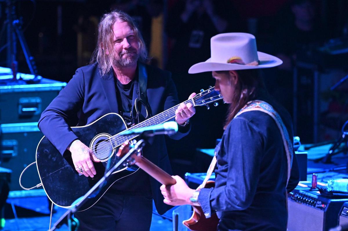 Devon Allman, son of The Allman Brothers’ Gregg Allman, plays alongside Duane Betts, son of Dickey Betts, during the “In Memory of Dickey Betts” concert on Friday, Feb. 28, 2025, at the Macon City Auditorium in Macon, Georgia. Musicians from across the country gathered in Macon for a one night only, sold out concert honoring one of the original members of The Allman Brothers, guitarist Dickey Betts, who died in April 2024.