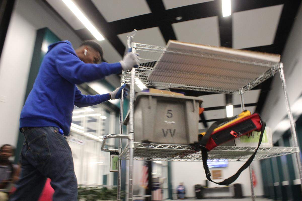 An election worker delivered ballots and memory cards to the Board of Elections office around 8:30 p.m. on Tuesday, Nov. 5, 2024.