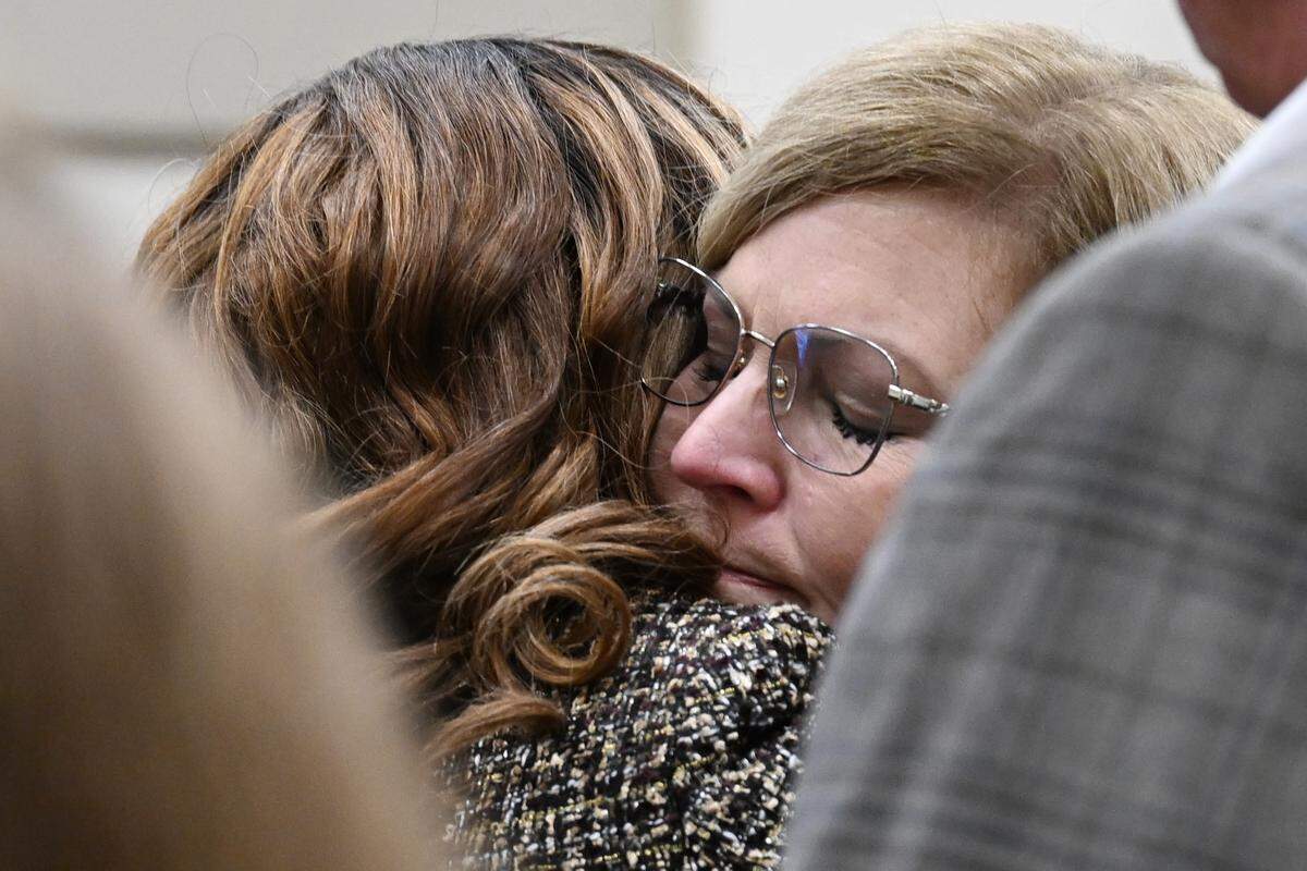 Jeannie Childs (right), mother of William Childs, hugs Macon Judicial Circuit District Attorney Anita Howard at the sentencing of Eric Head on Thursday, Oct. 30, 2025, at the Bibb County Superior Courthouse in Macon, Georgia. Twenty-two year old William Childs died in July 2021 after a boat driven by Eric Head crashed into a pontoon boat Childs was on on Macon’s Lake Tobesofkee. Head received a guilty verdict and was given the maximum penalty of 20 years in prison.