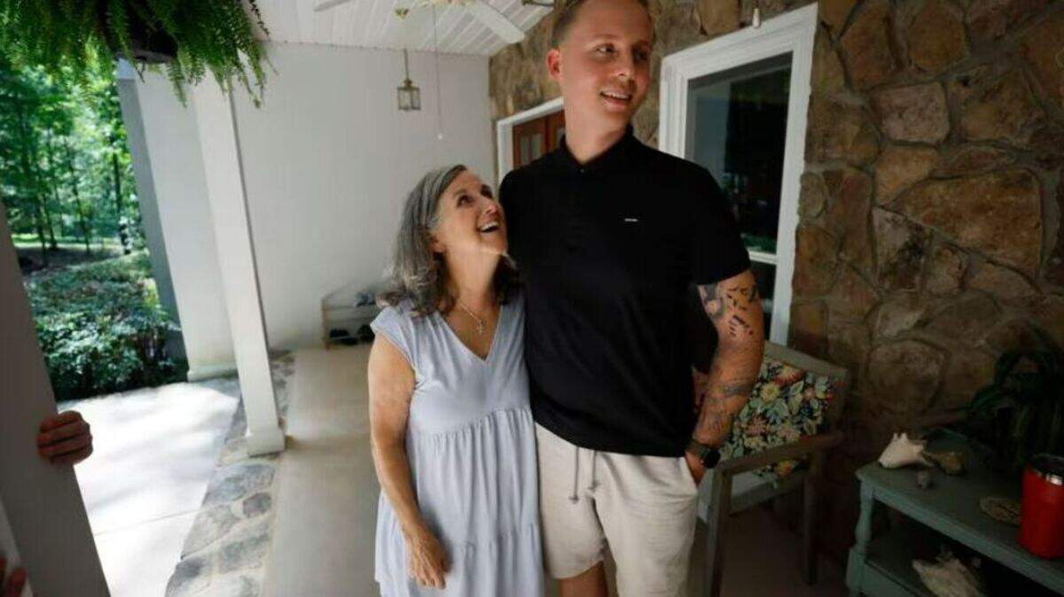 Dale Tingle (left) and Kevin Krüger from Germany interact outside Tingle’s home in Watkinsville, Ga. This is the third time Krüger has visited the Tingle family. Thirteen years ago, Tingle donated stem cells to save an anonymous stranger dying of blood cancer. It turned out that stranger was Krüger, who lives thousands of miles away. Now, the two are like family. 