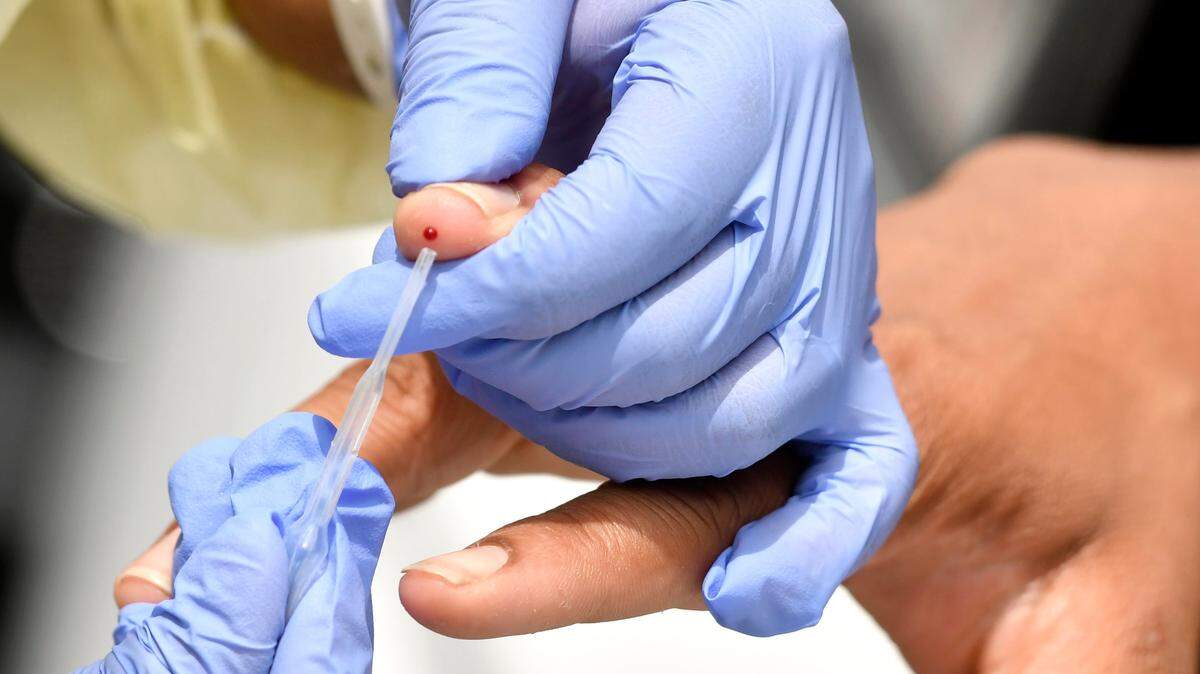JASON VORHEES/THE TELEGRAPH Macon, GA, 07062020 The Community Church of God partnered with the Community Empowerment Center to offer free COVID-19 drive-thru antibody and swab testing July 6.