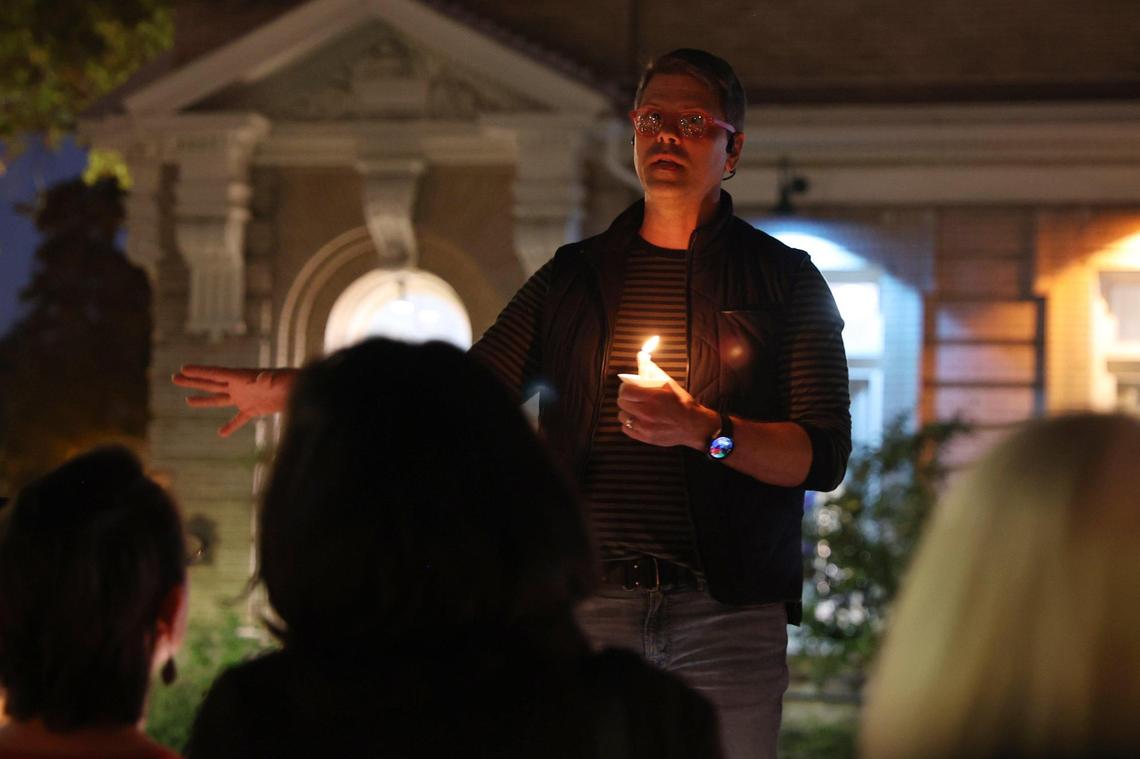 Scott Mitchell speaks to attendees at a candlelight vigil in the Cotton Avenue Plaza on Tuesday, Nov. 12, 2024, in downtown Macon, Georgia. Rather than honoring the life of someone who has passed, Mitchell said that the vigil was an opportunity for members of the LGBTQ+ community and allies to gather following the results of Election Day a week prior.