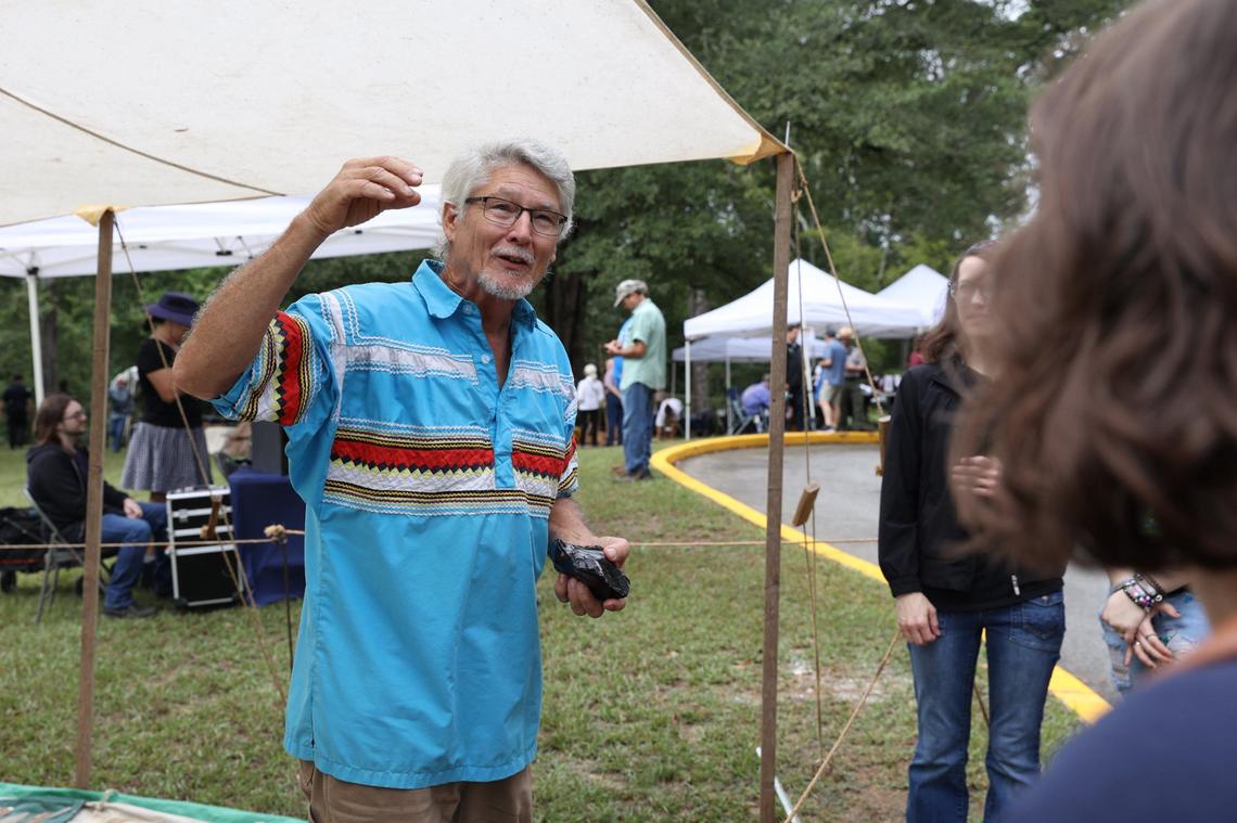 Ben Kirkland speaks to festival attendees during a demonstration at the 2024 Ocmulgee Indigenous Celebration on Saturday, Sept. 14, 2024, at Ocmulgee Mounds National Historical Park in Macon, Georgia. Ocmulgee Mounds National Historical Park hosted its 32nd Ocmulgee Indigenous Celebration, which featured cultural dancing, storytelling and demonstrations from the Muscogee (Creek) Nation and other southeastern tribes.