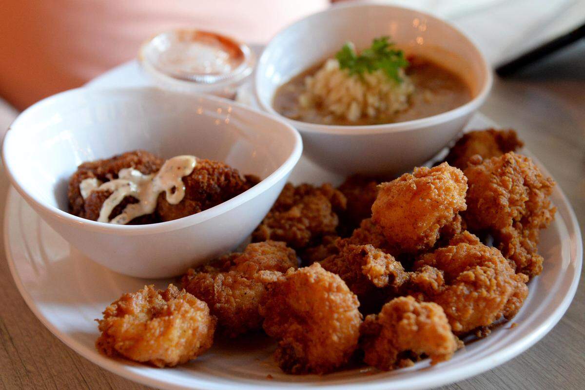 Reporter Justin Baxley ordered a fried shrimp platter with gumbo and jambalaya hush puppies at Kudzu Seafood for this week’s #FoodieFriday.