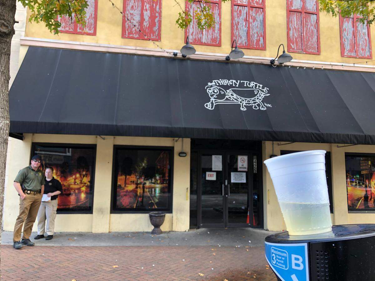 The scene outside the Thirsty Turtle nightclub on Cherry Street in downtown Macon on Friday in the wake of a deadly shooting.