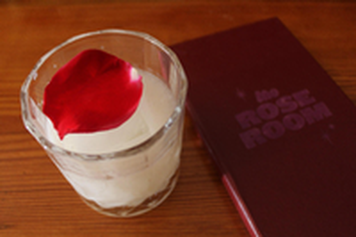 The Tequila Rose sits on the bar at The Rose Room on Saturday, June 8, 2025, in Macon, Georgia. The cocktail consists of yogurt washed tequila, lychee, lime, rosewater and a rose petal.