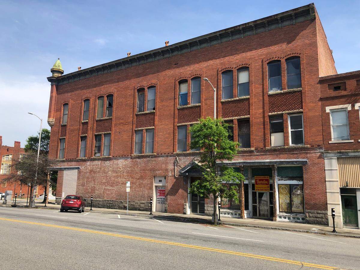 The upper floors of the 1891 Newman Building will be used for a ballroom and event space for the new hotel.