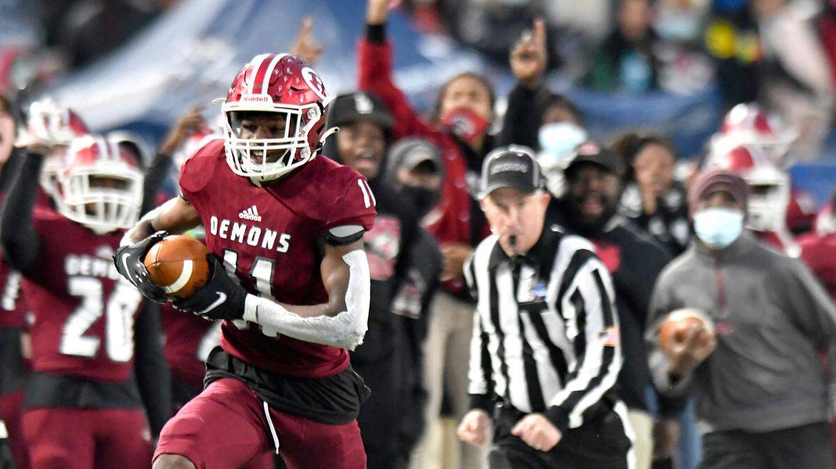 Warner Robins receiver Daveon Walker (11) helped the Demons knock off Cartersville in the state title game last season. On Friday night the two teams meet again in the playoffs.