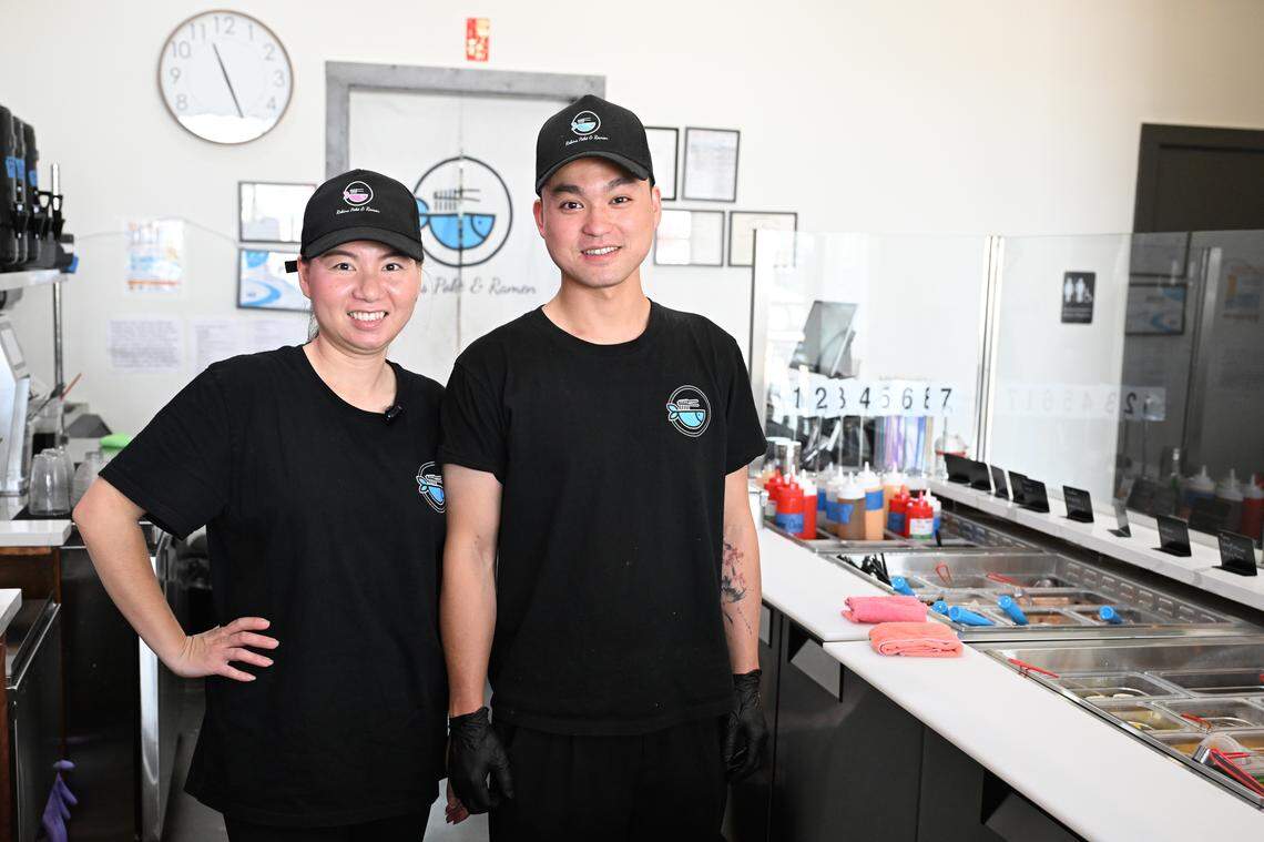 Robins Poke & Ramen co-owners Yazhen “Jenny” Dong and Bin Dong. The first cousins are first-time restaurant owners.