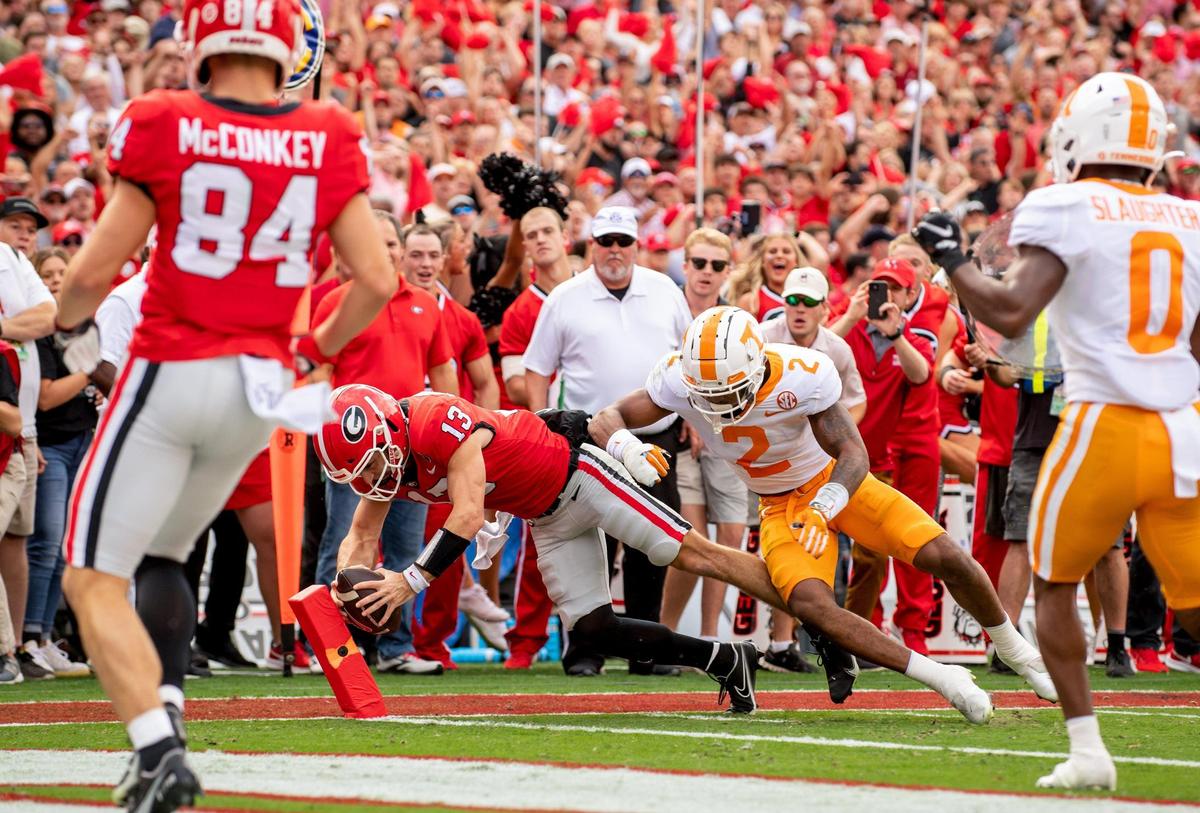Georgia quarterback Stetson Bennett crosses the goal line for a touchdown in first half action against Tennessee Saturday in Athens.
