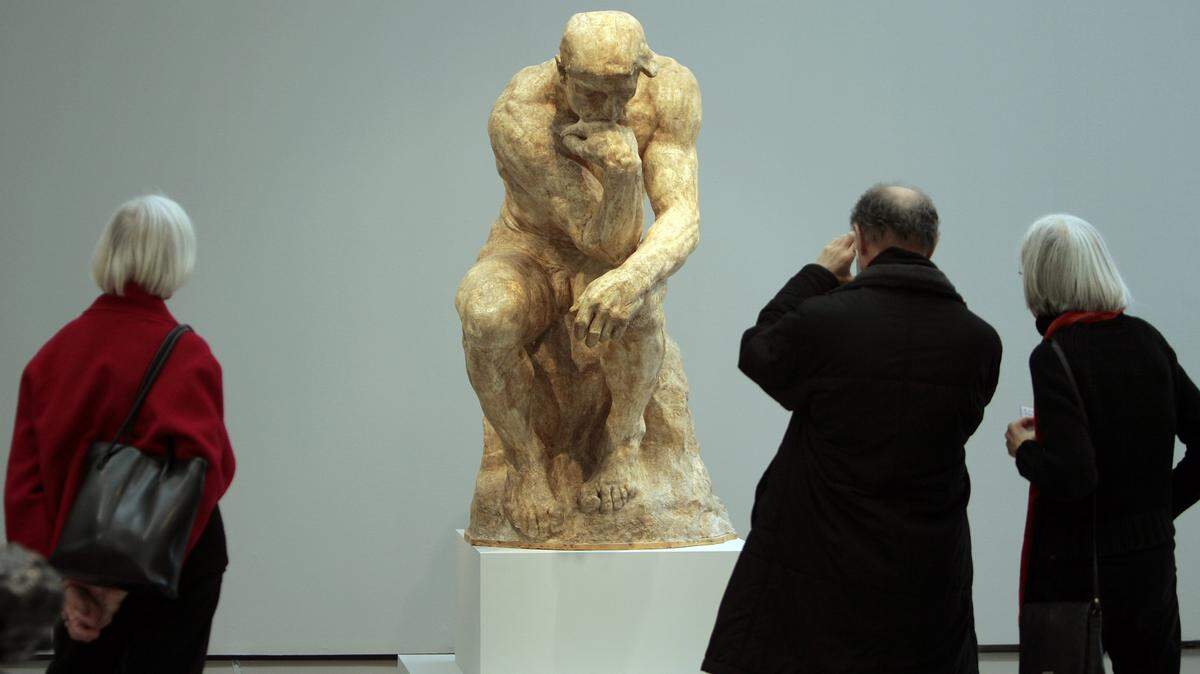 Is Auguste Rodin's "The Thinker" modeled on The Cool Kid? Is the sky green?
